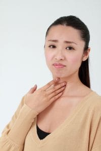 逆流性食道炎の女性